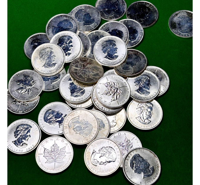 Серебряная инвестиционная монета 5$ Кленовый Лист 2012 года, Канада, 1 унция