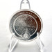 Серебряная монета Terra 2025 1 oz Ag .9999 — 2 $ с тематикой защиты планеты